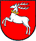 Herb województwa lubelskiego: biały jeleń w skoku na czerwonym polu.