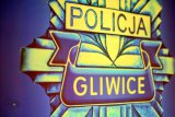 policyjna odznaka z napisem Policja Gliwice
