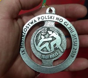 medal, który otrzymał asp. Krzysztof Babisz
