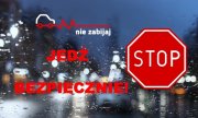 grafika z napisem nie zabijaj — jedź bezpiecznie w tle mokra szyba, po prawej stronie znak drogowy STOP