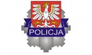 logo krakowskiej Policji: policyjna odznaka, orzeł w koronie i napis Policja