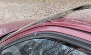 Na zdjęciu widać fragment przedniej części samochodu osobowego