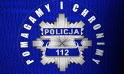 Gwiazda policyjna z napisem Policja i nr 112. Wokół niej znajduje się napis o treści Pomagamy i chronimy