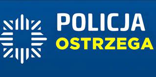 na granatowym tle biały symbol graficzny policyjnej gwiazdy, a obok biały napis: Policja, a pod spodem napis żółty: ostrzega