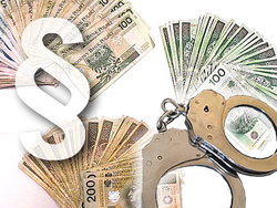 na banknotach naniesiony znak paragrafu i kajdanki