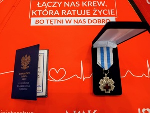 Legitymacja i odznaczenie.