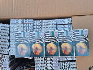 Zabezpieczone papierosy w kartonach.