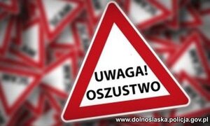 Znak z napisem "Uwaga! Oszustwo.